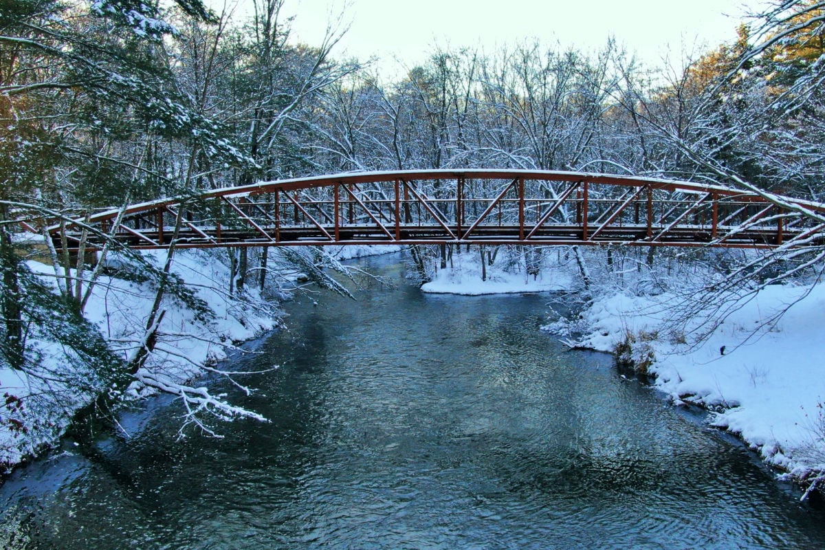 Bridge over icy river in Chippewa Valley, WI